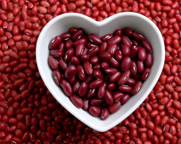 A bowl of beans in the shape of a heart.